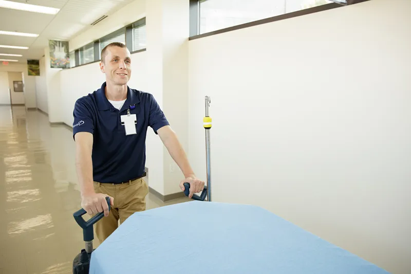 A Staff at Touchpoint is cleaning the floor