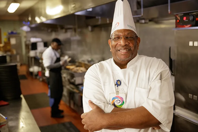 A smiling chef