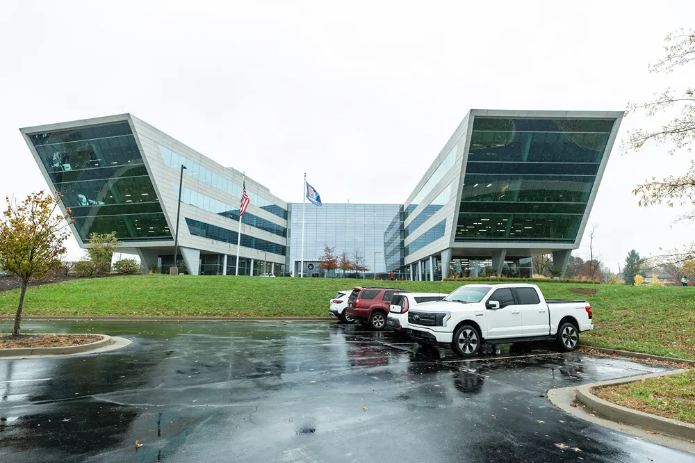 The modern and unique architecture of the Valvoline corporate headquarters on a cloudy day.