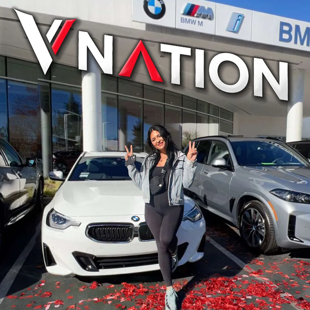 Victra employee celebrating at a car dealership