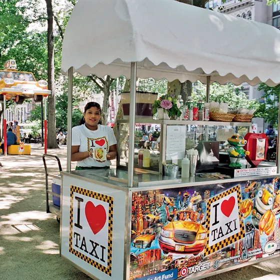 Woman at a New York City I Heart Taxi food cart