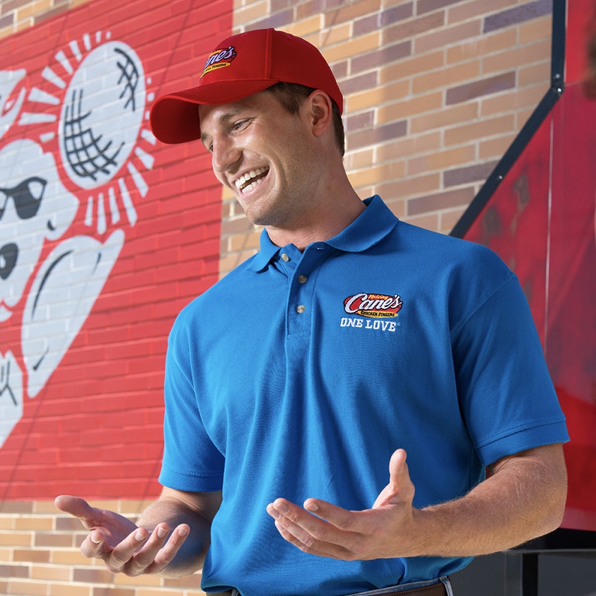 a male employee laughing