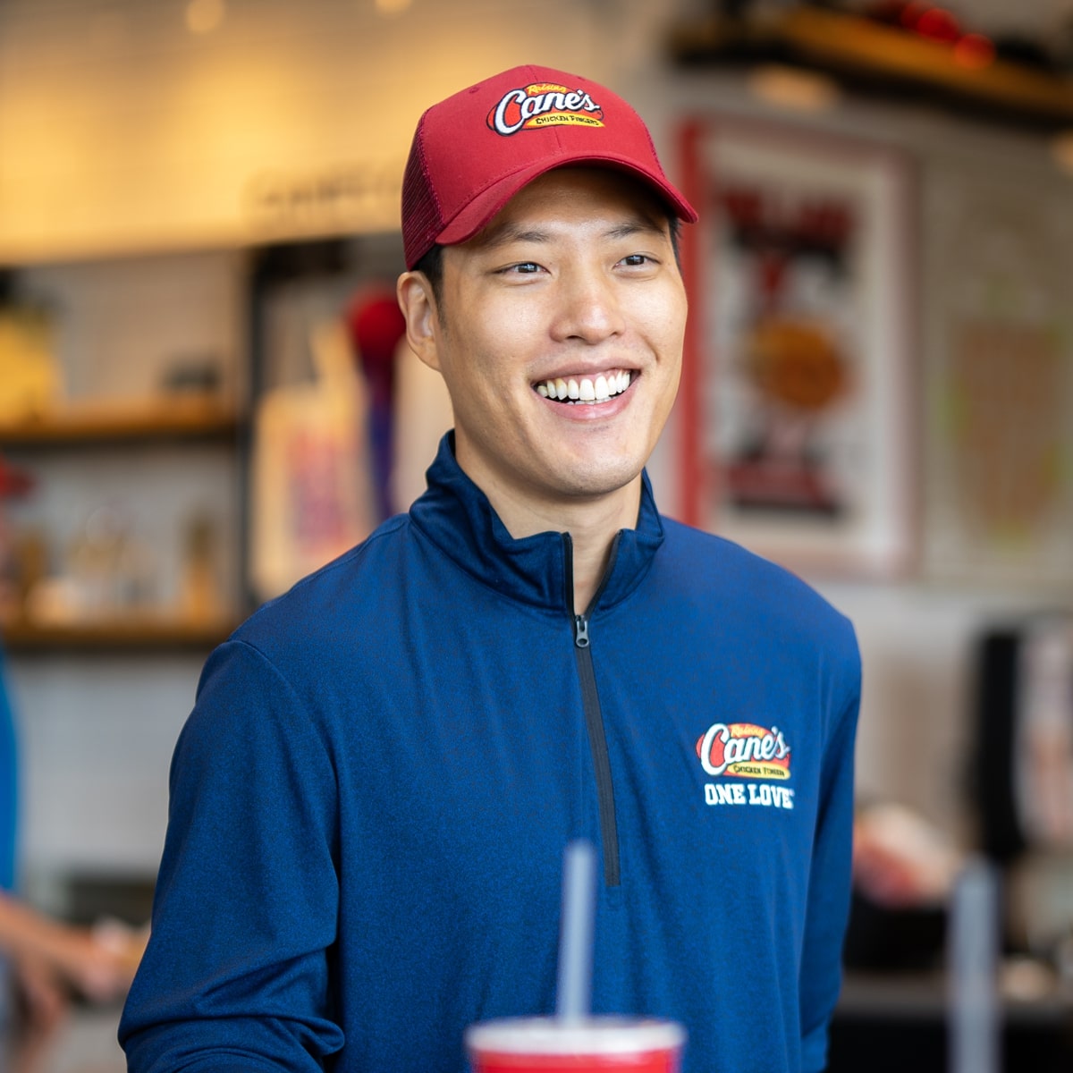 a male employee smiling