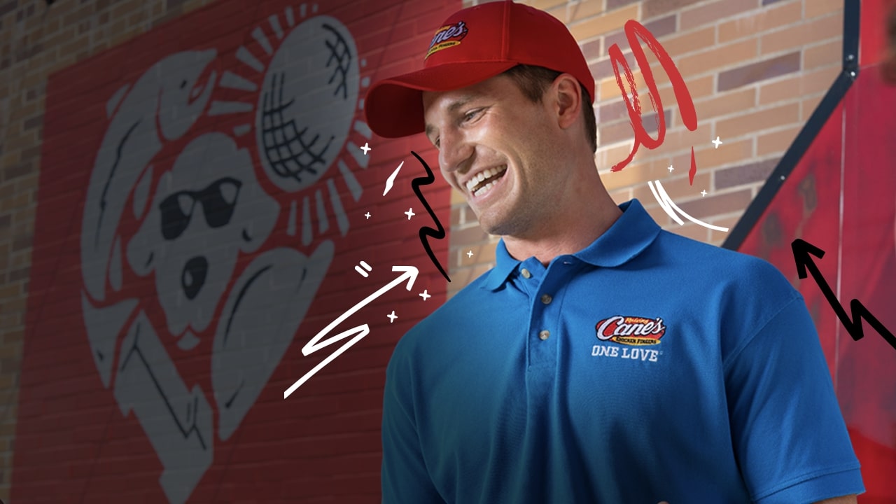 A male employee laughing
