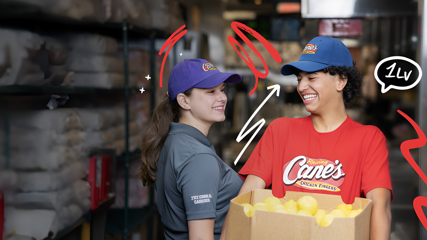 2 employees holding packages