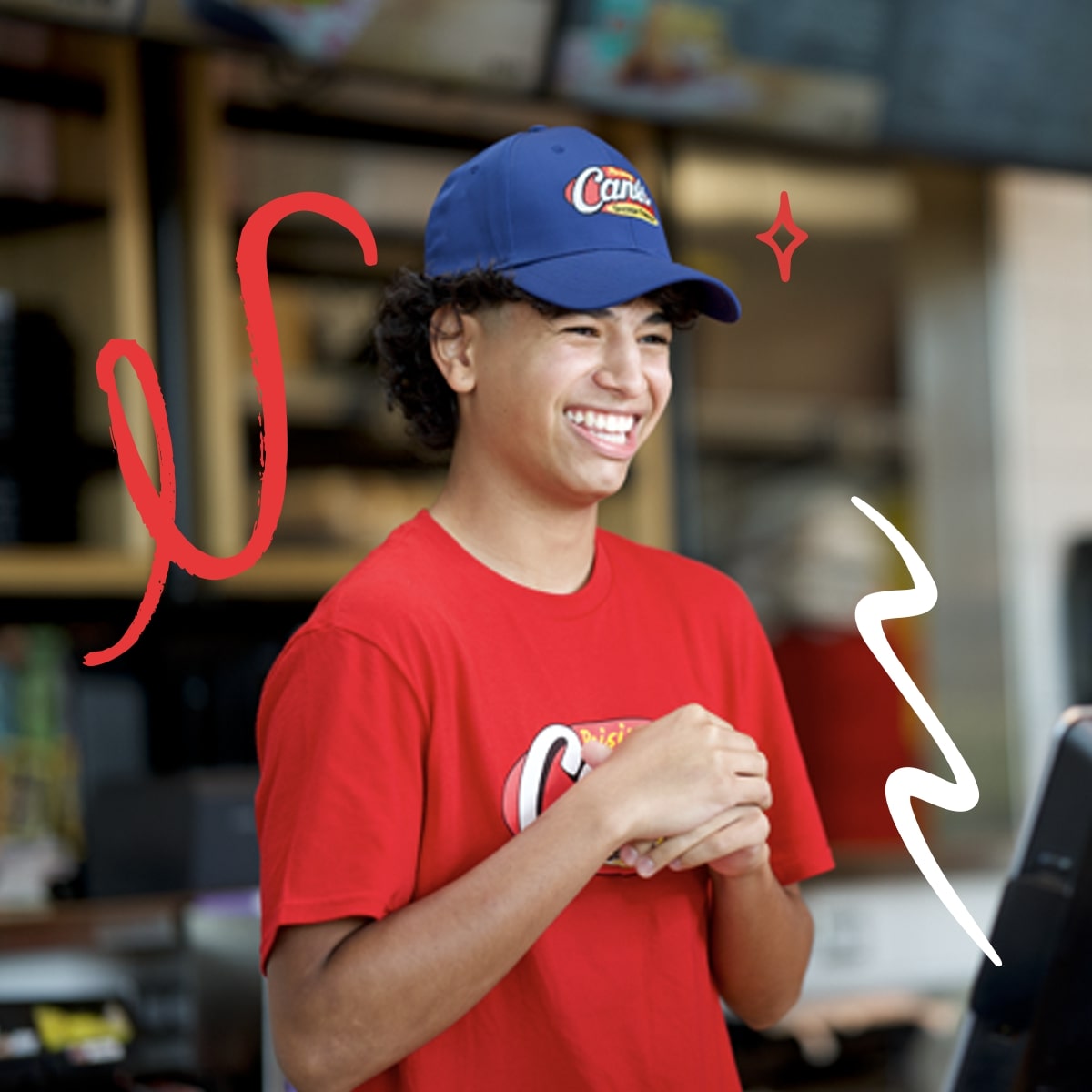 a male employee smiling
