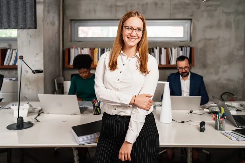 Woman smiling in conference room