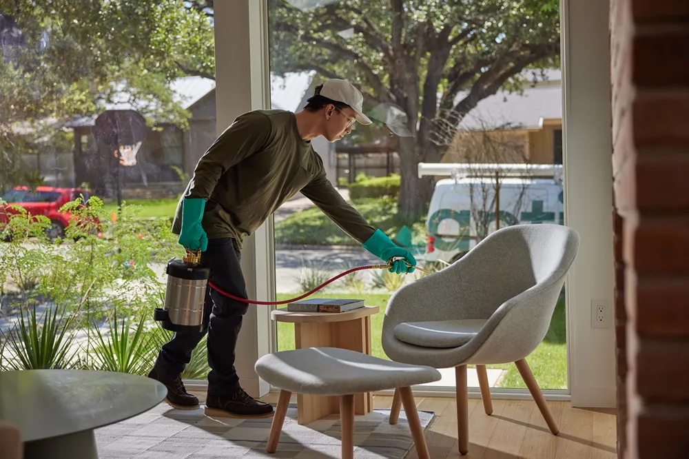 a man cleaning a house