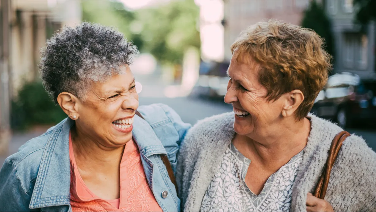 2 women laughing