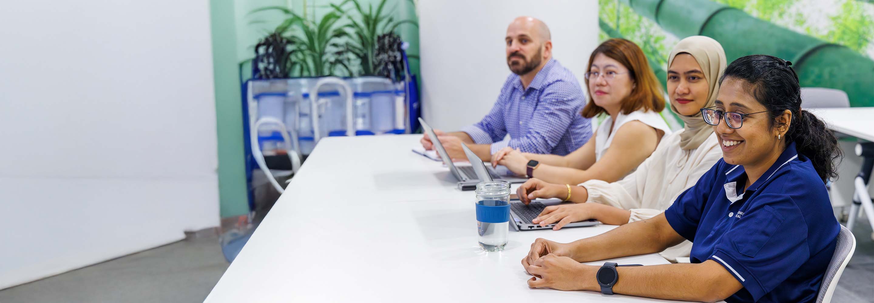Global Business Services professionals collaborating in a modern office environment