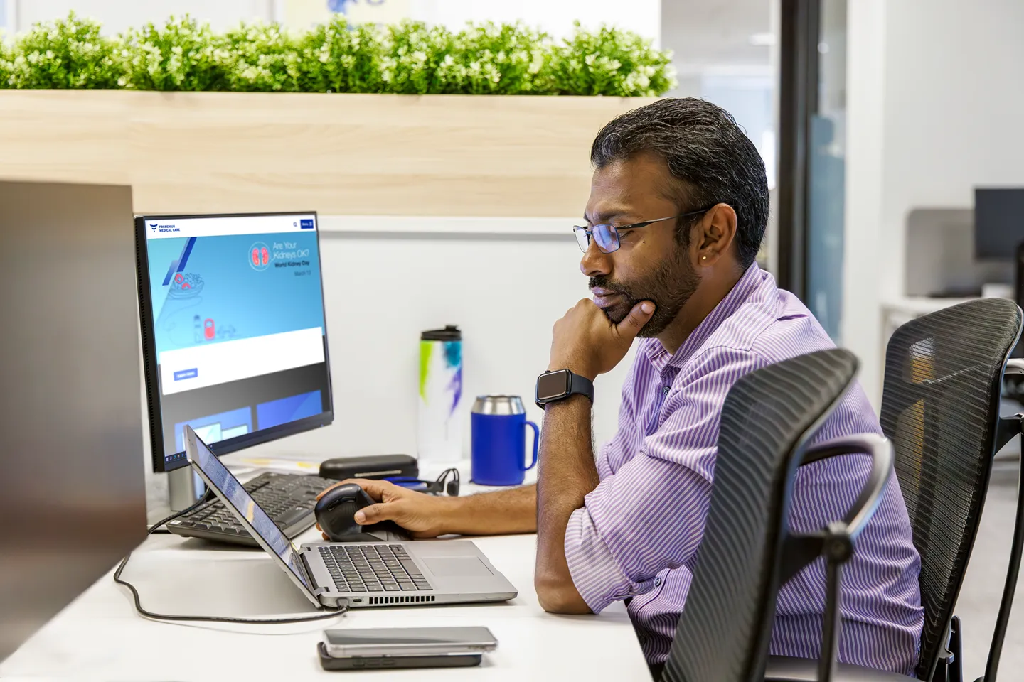 Data analyst reviewing insights and performance metrics