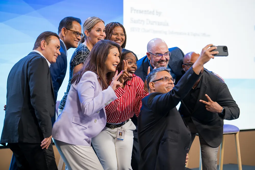 some people holding an award
