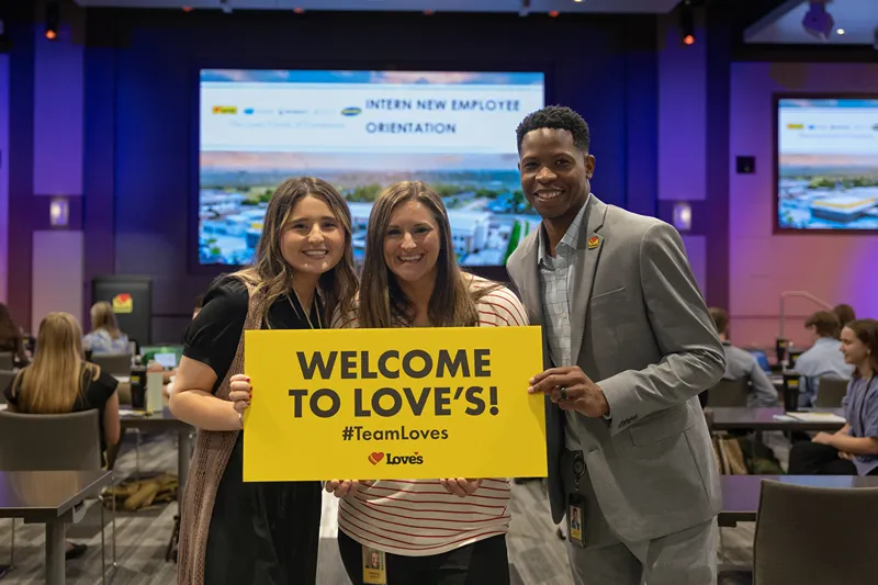 A group of interns and young professionals at a Love's company event.