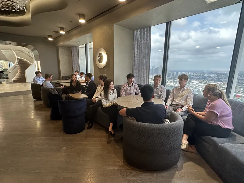 A group of young professionals in the Love's early careers program collaborating on a project.