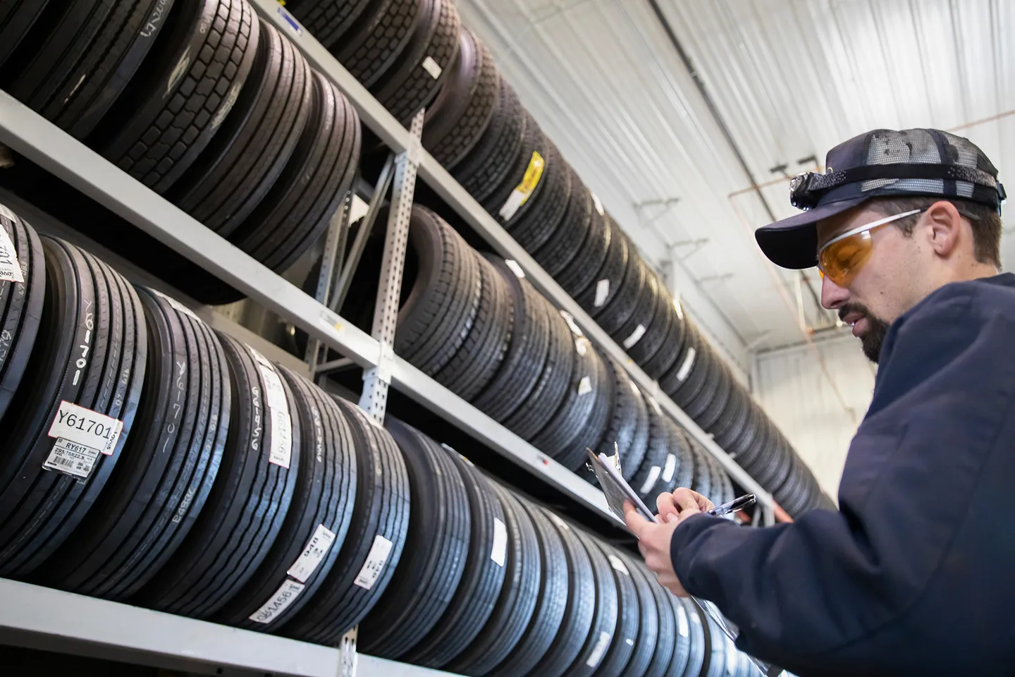 Hero image for Truck Care & Speedco careers, with a skilled technician working on a commercial truck.