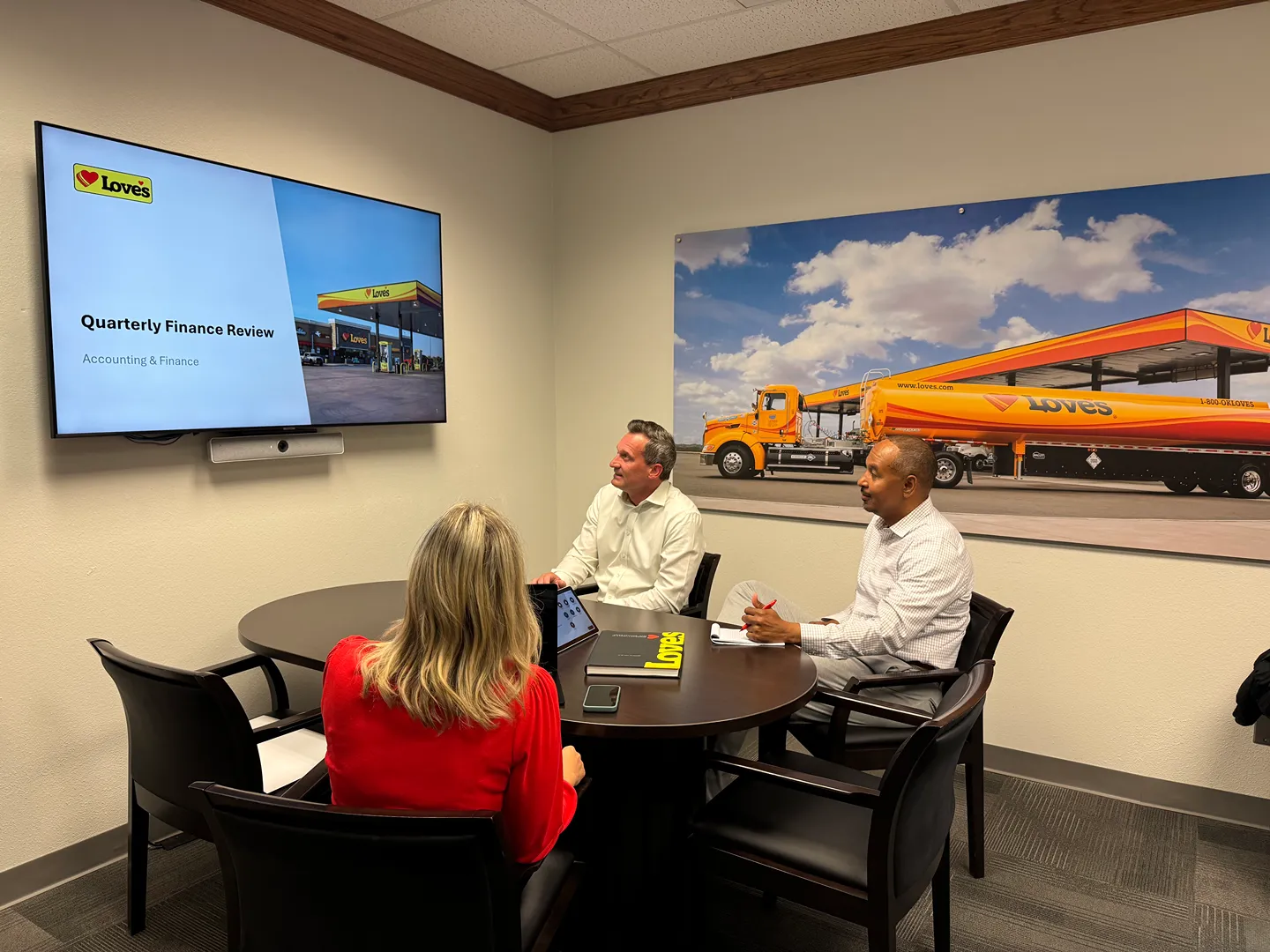 Hero image for Accounting careers, with two professionals reviewing financial documents in an office.