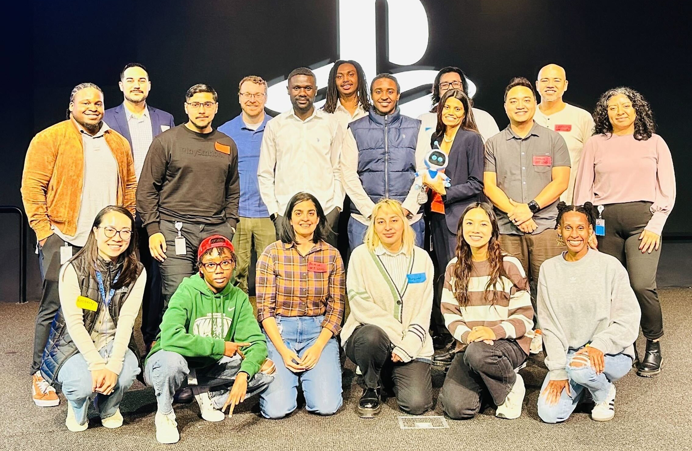 SIE Apprentice Program cohort group photo on stage
