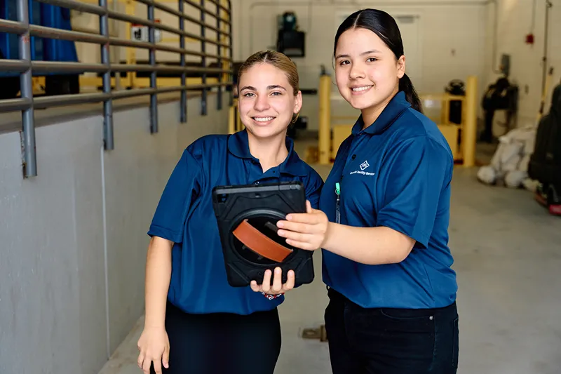 A KBS field manager mentoring a team member, showcasing their impact as a leader.