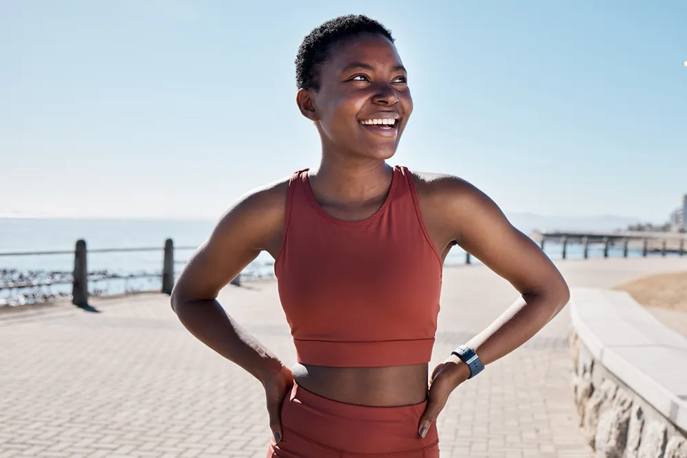 a woman in a sports wear jogging