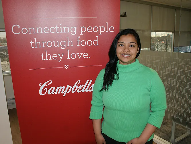Meeta with Campbell's banner
