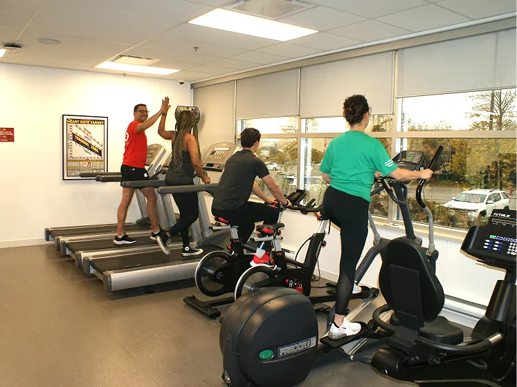 Our headquarters fitness center with treadmills and rowing machines