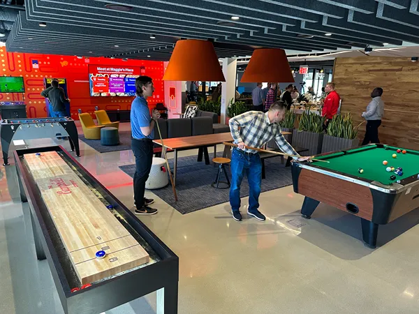 Employees enjoying the game room at our headquarters