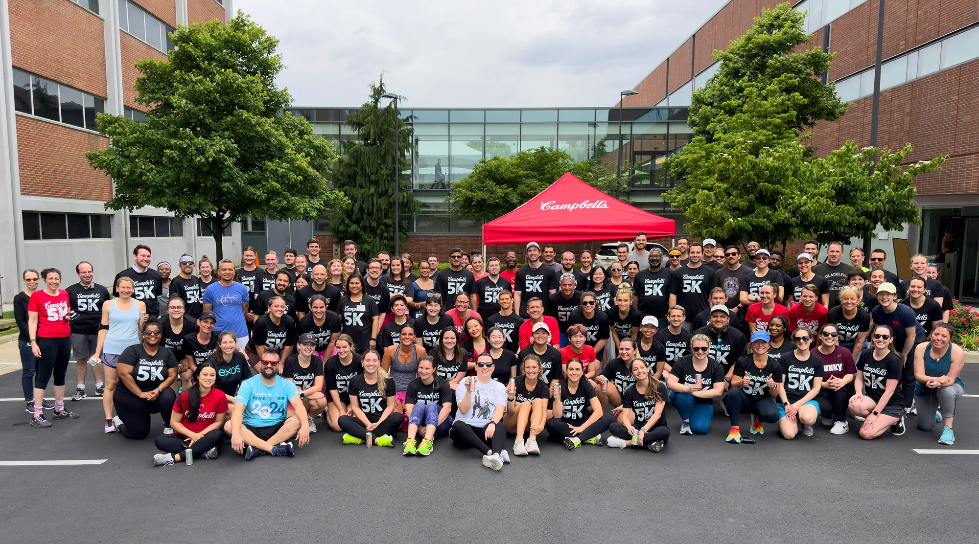 Large group of Campbell's employees participating in a 5K run