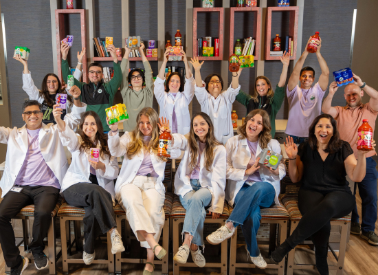 Group of people celebrating in office