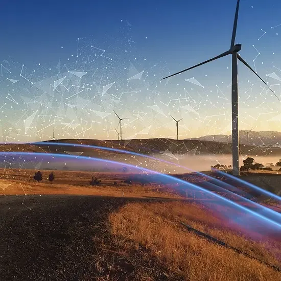 A stylized photo of a wind turbine with rolling hills in the background