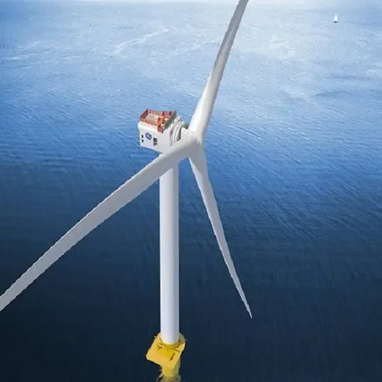 A large wind turbine in the middle of a body of water