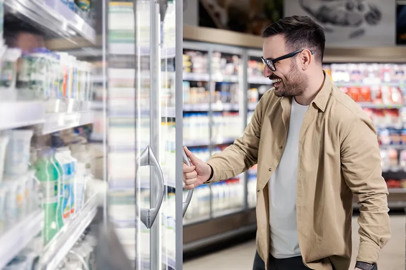 A man shopping in a convience store