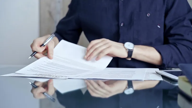 A person reviewing documents