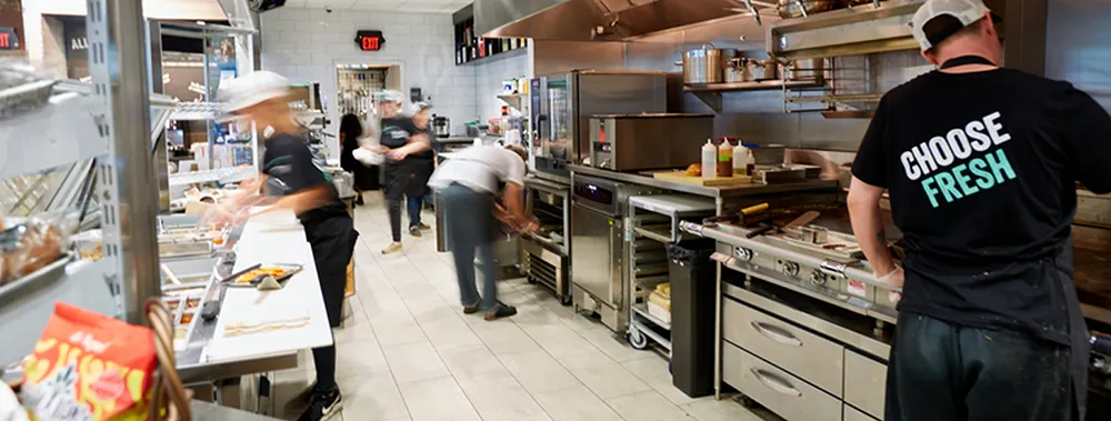 A photo of the inside of a industrial kitchen
