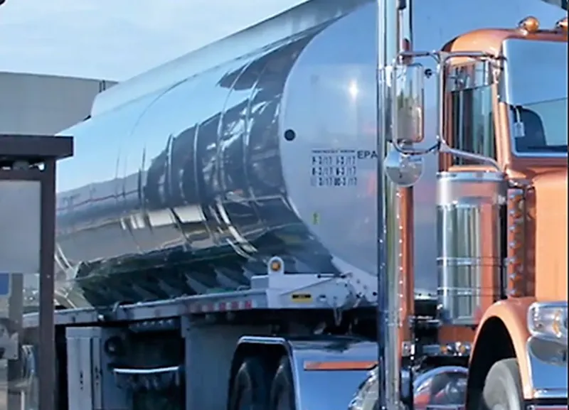 Photo of the side of large fuel tanker