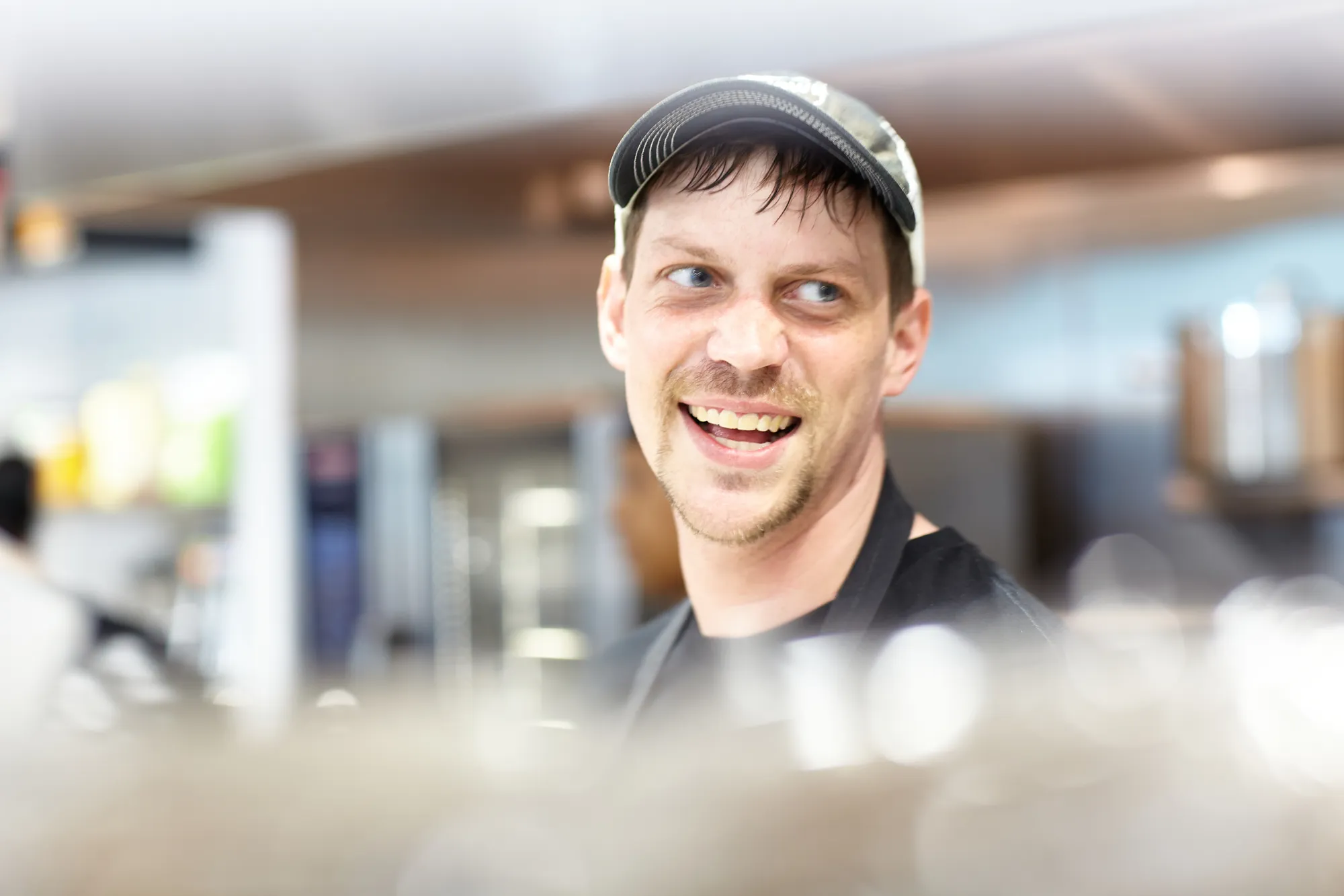 A man working behind a food counter