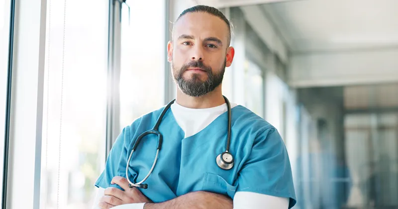 A photo of a nurse with folded arms