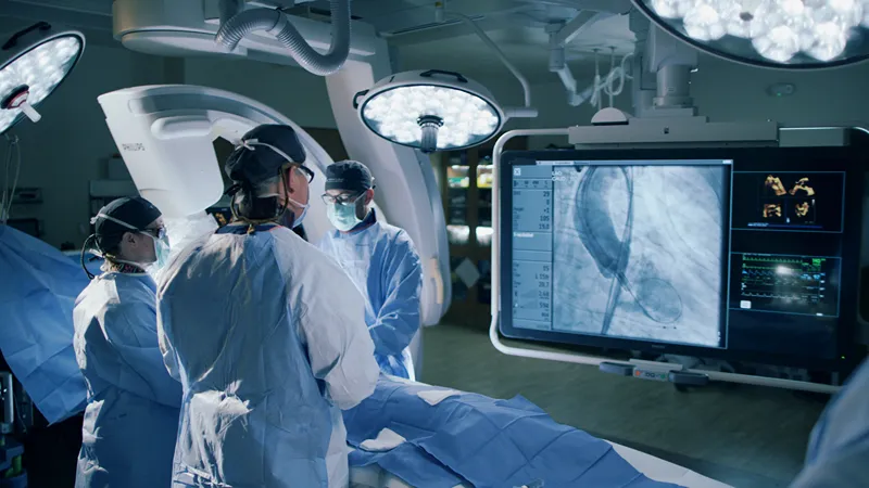 A group of medical professionals performing surgery