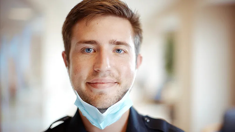 A closeup photo of a man looking into the camera