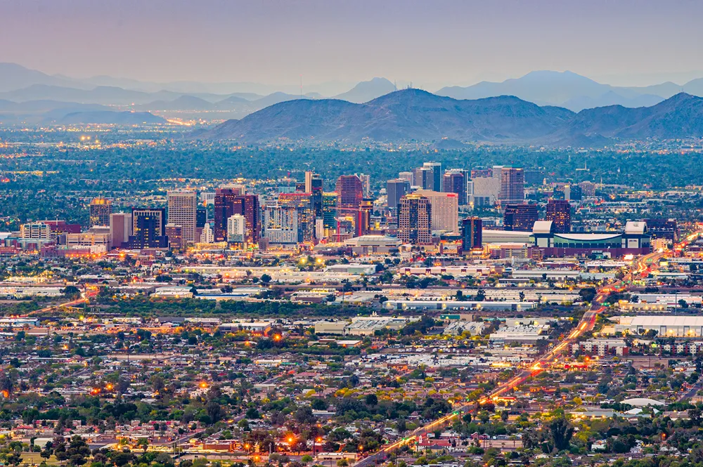 Phoenix city skyline with desert mountains in the background