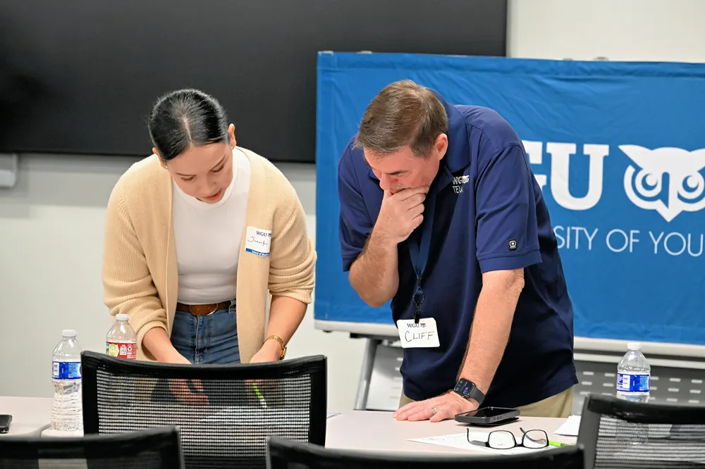 WGU team members collaborating at a company event