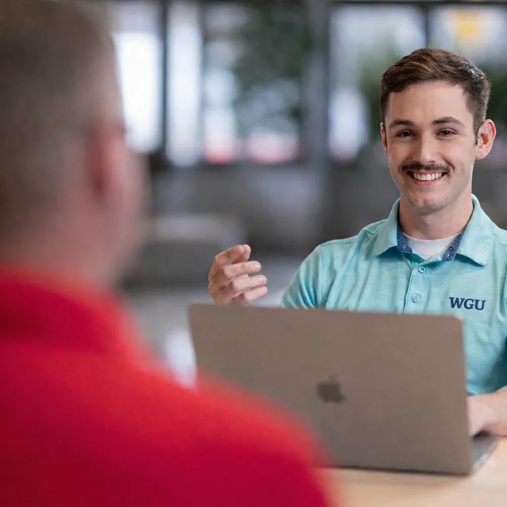 WGU team members collaborating at a company event