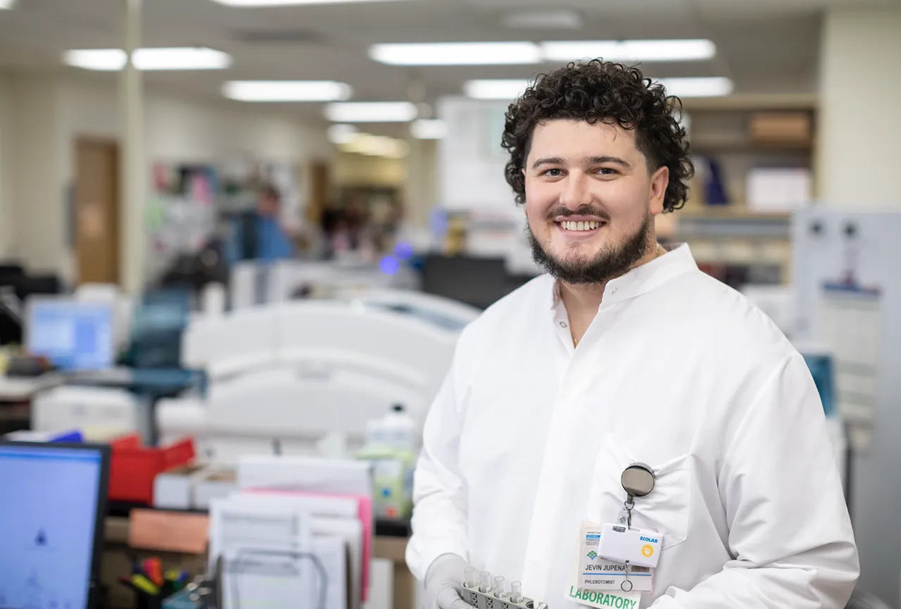 Lab professionals at work.