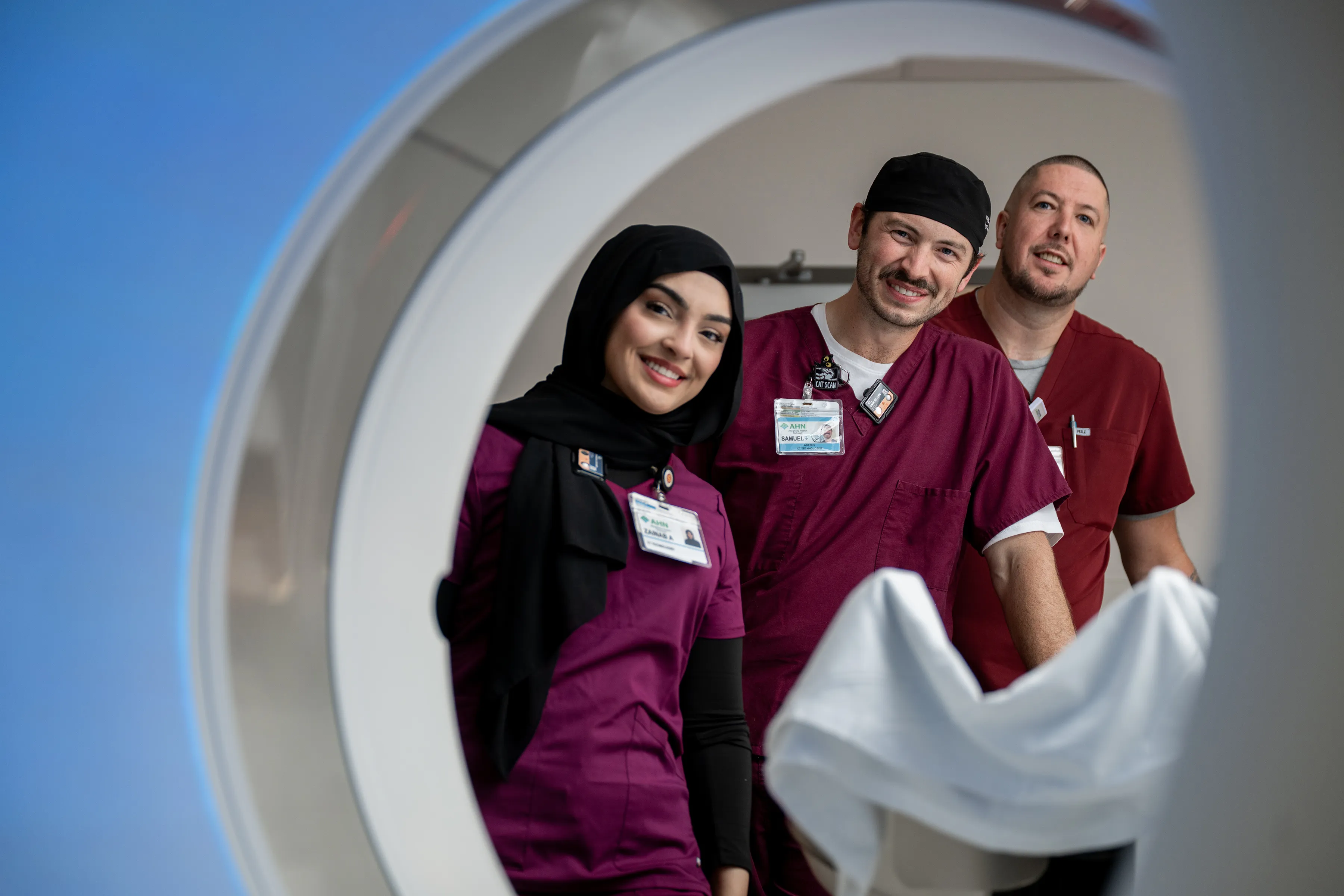 Imaging technologist operating MRI machine