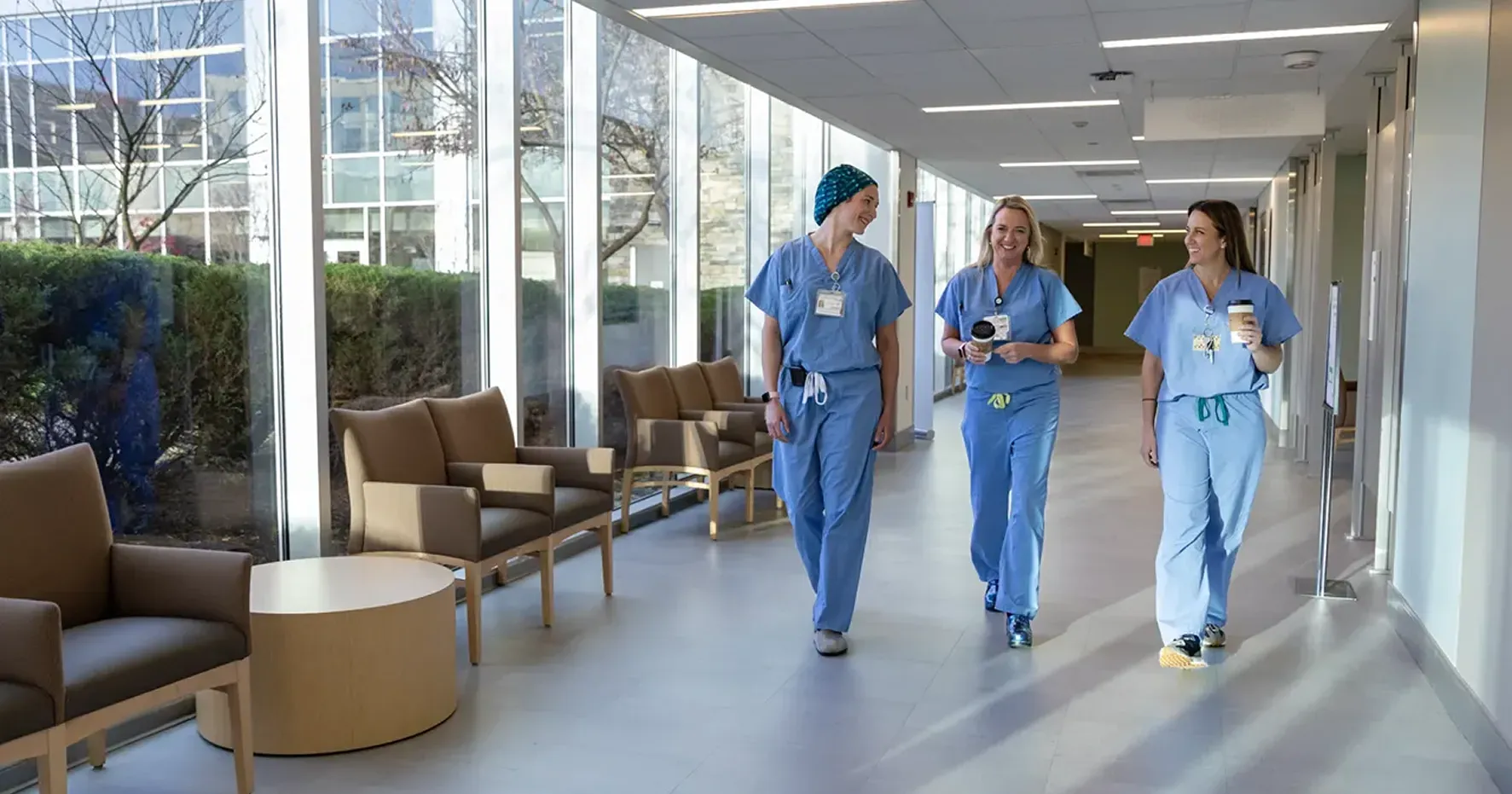 Highmark Health's employee walking and talking.